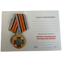 Preismedaille für den russischen Veteranen von Tschernobyl zum 35. Jahrestag der Katastrophe
